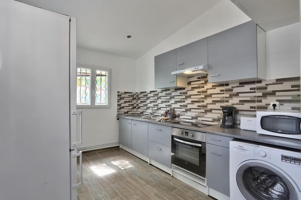 Villa Paris Nord: Tranquil Retreat with Private Parking and Garden Epinay-sur-Seine Exterior photo